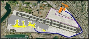 The orange oval in this picture is the CO NRAC. The blue line shows the connecting perimeter road to the terminal. This picture also show the station platforms and pedestrian bridge that will be built after 2016